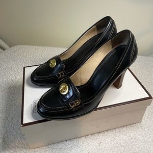 Coach turn lock heel.